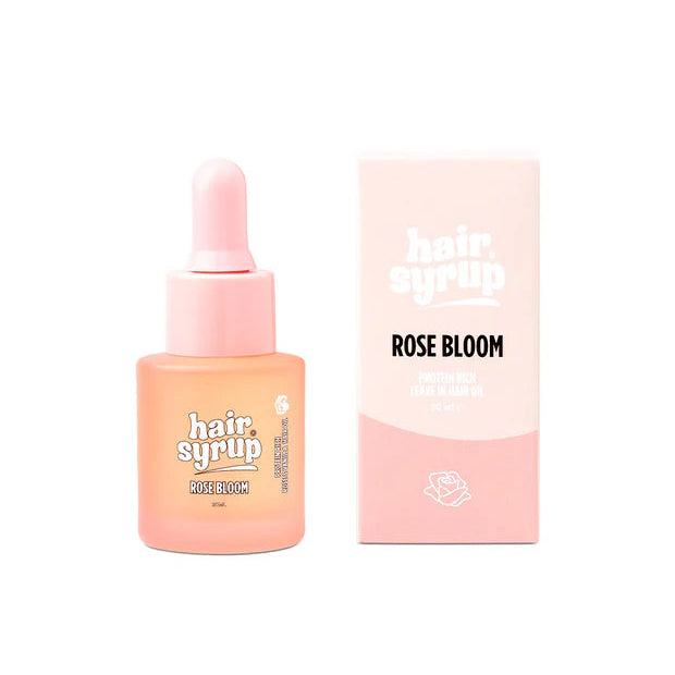 Hair syrup bottle and packaging on a white background